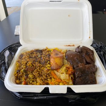 Island Vibes Caribbean Grill - Brown Stew Chicken w yellow rice - Caribbean Near Me - Atlanta, Georgia