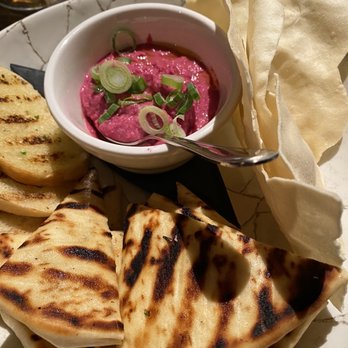 Stirling Lounge - Warm Flat Breads grilled naan, baguette, papadum and roasted beet hummus very good. - Lounges Near Me - Canmore, Alberta Stirling Lounge - Warm Flat Breads grilled naan, baguette, papadum and roasted beet hummus very good. - Lounges Near Me - Canmore, Alberta