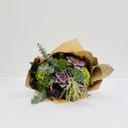 Hand Tied with succulents and green trick wrapped in burlap