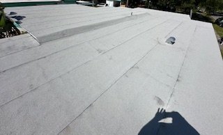 Slide of JAT Roofing