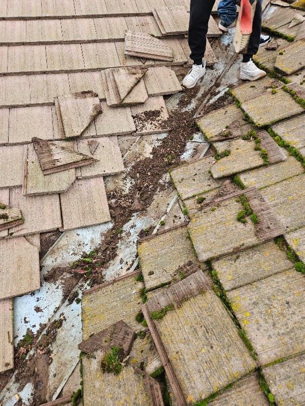 Slide of Action Roofing Service