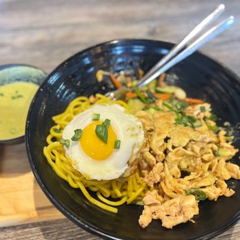 Wave Bowl - a bowl of noodles with a fried egg on top - Korean Near Me - Plano, Texas