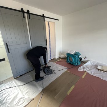 Speedy Restoration - a man working on the floor - Damage Restoration Near Me - Pleasanton, California Speedy Restoration - a man working on the floor - Damage Restoration Near Me - Pleasanton, California