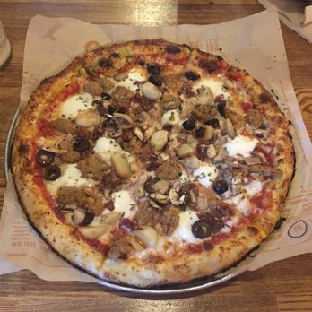 Blaze Pizza - Fresh Mozzarella, Italian sausage, Mushrooms, Black Olives, Roasted Garlic & Oregano Pie. - Salad Near Me - Davie, Florida