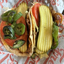 Freddy's Frozen Custard & Steakburgers - 2 steak burger tacos (you can put a lot of things on them)