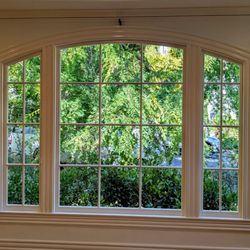 Portals Wood Window & Door - Large, arched window replaced by Portals Window, June 2025
