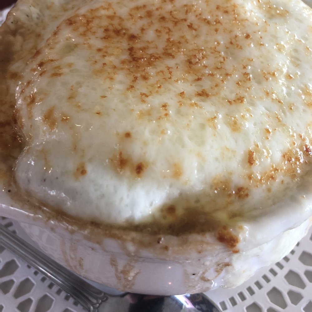 a bowl of food with a spoon