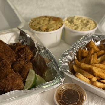 YUPPI - a tray of fried chicken and french fries - Chicken Wings Near Me - Tampa, Florida YUPPI - a tray of fried chicken and french fries - Chicken Wings Near Me - Tampa, Florida