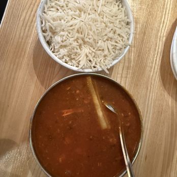 Tamarind Indian Cuisine - Chicken Vindaloo with Rice - Indian Near Me - Winter Park, Florida Tamarind Indian Cuisine - Chicken Vindaloo with Rice - Indian Near Me - Winter Park, Florida