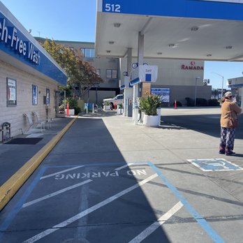 Chevron - a woman walking towards a gas station - Gas Stations Near Me - San Bruno, California Chevron - a woman walking towards a gas station - Gas Stations Near Me - San Bruno, California