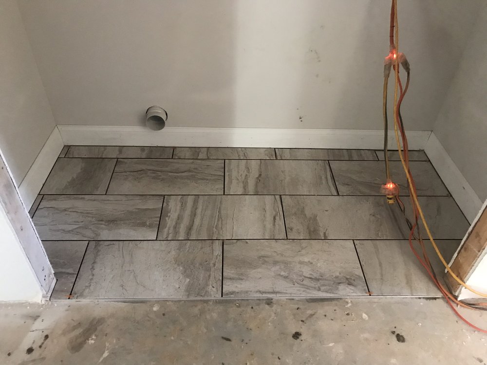 Slide of OAS Construction Roofing Concrete Floors