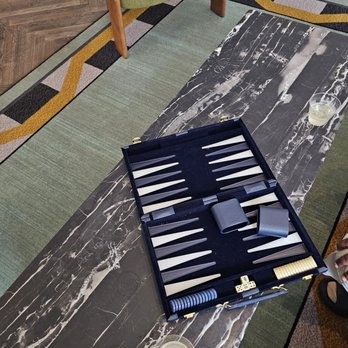 Le Meridien Indianapolis - Backgammon and complimentary bubbles in the lobby - Hotels Near Me - Indianapolis, Indiana