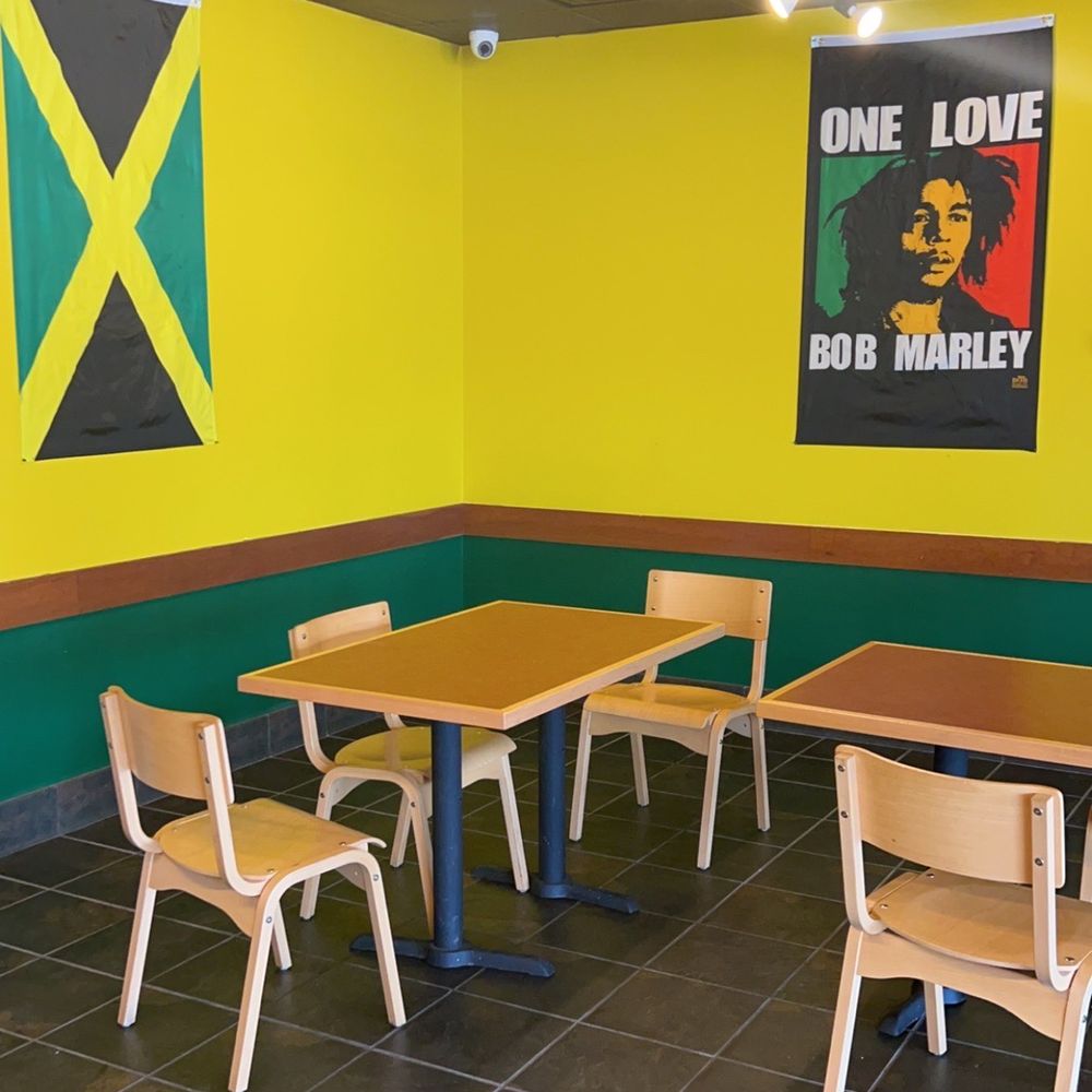 a dining area with tables and chairs a dining area with tables and chairs