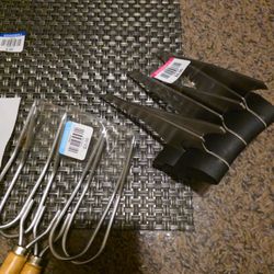 Goodwill of the Great Plains - Meat shredder, pick forks, i intend to use for the garden and flexible plastic mat for possible craft project.