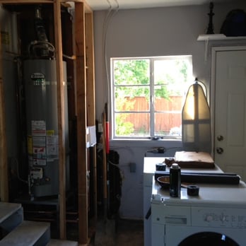 Baker Plumbing - New water heater before the compartment was built. - Plumbing Near Me Baker Plumbing - New water heater before the compartment was built. - Plumbing Near Me
