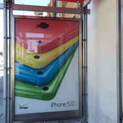 MUNI - 9 San Bruno - Advertisement for the current Apple iPhone 5C now available at Verizon Wireless and other wireless carrier retail stores