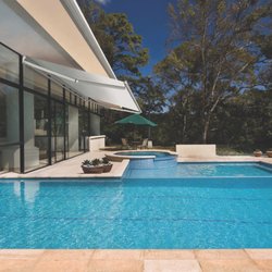 KE Outdoor Design - Poolside shade on demand.