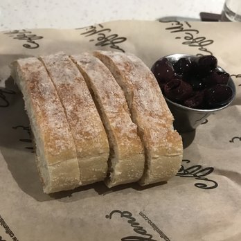 Caffé Milano - Warm bread with tasty olives, complimentary - Italian Near Me - Naples, Florida Caffé Milano - Warm bread with tasty olives, complimentary - Italian Near Me - Naples, Florida