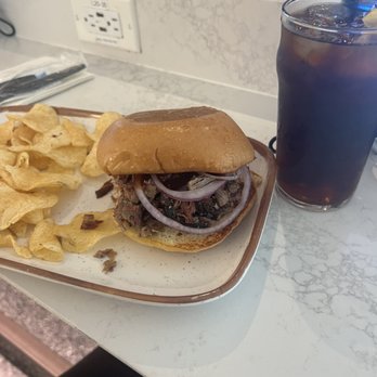 Q Bar - BBQ Brisket on butter toasted brioche with kettle chips - Bars Near Me - Houston, Texas Q Bar - BBQ Brisket on butter toasted brioche with kettle chips - Bars Near Me - Houston, Texas