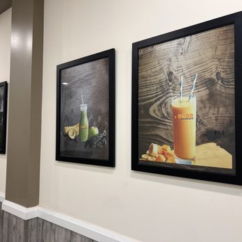I Heart Boba - a long hallway with framed pictures - Bubble Tea Near Me - Mississauga, Ontario I Heart Boba - a long hallway with framed pictures - Bubble Tea Near Me - Mississauga, Ontario
