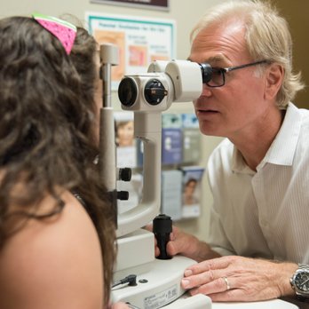 Eye Trends - Dr. Inns examining a patient. - Eyewear & Opticians Near Me - Conroe, Texas
