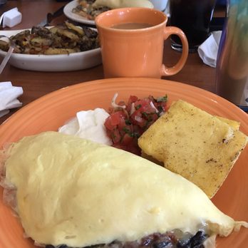 Home Kitchen Cafe - Veggie Omelette with Polenta and a cup of coffee. Also had a side of potatoes . - Breakfast & Brunch Near Me - Rockland, Maine Home Kitchen Cafe - Veggie Omelette with Polenta and a cup of coffee. Also had a side of potatoes . - Breakfast & Brunch Near Me - Rockland, Maine