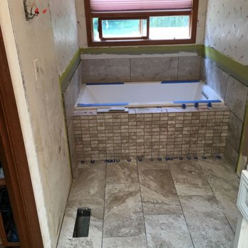 Ephesus Tile & Marble - a bathtub in a bathroom - General Contractors Near Me - Lake Stevens, Washington Ephesus Tile & Marble - a bathtub in a bathroom - General Contractors Near Me - Lake Stevens, Washington