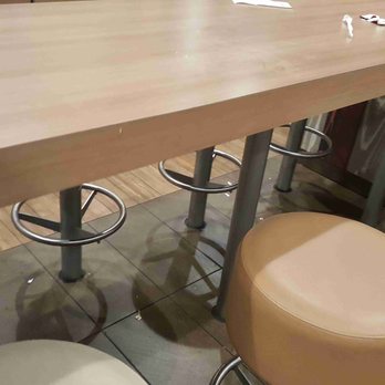 McDonald's - a row of stools at a table - Burgers Near Me - Nashua, New Hampshire