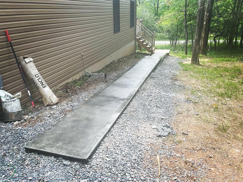 Slide of Rollison Masonry and General Contracting