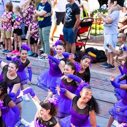 Our dancers performing down main streed in Disneyland