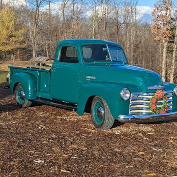 Cold Run Valley Winery - an old truck parked in a field - Wineries Near Me - Berkeley Springs, West Virginia