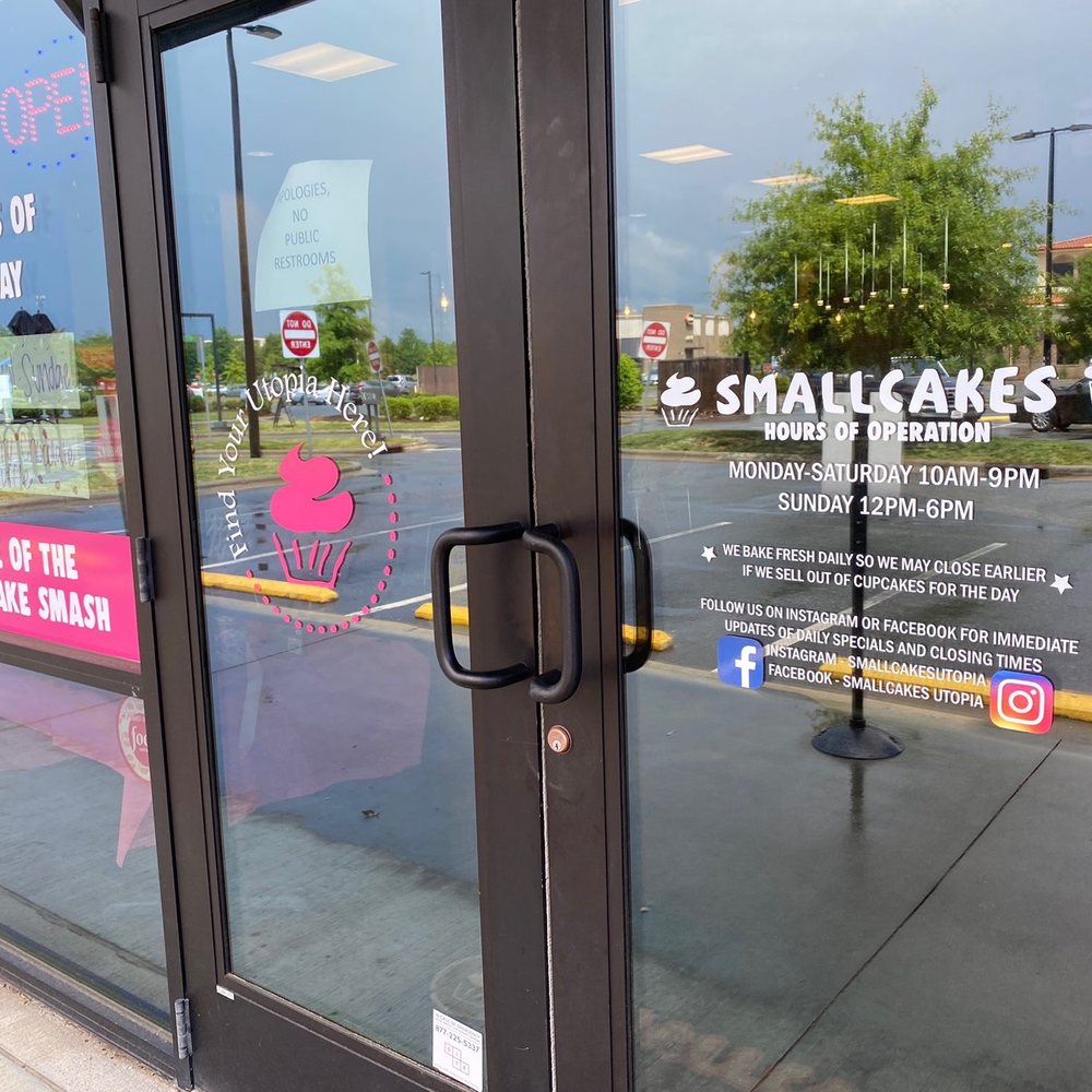 Smallcakes Utopia - Store door with hours listed - Cupcakes Near Me - Charlotte, North Carolina Smallcakes Utopia - Store door with hours listed - Cupcakes Near Me - Charlotte, North Carolina