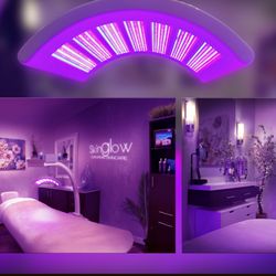SkinGlow - SkinGlow Salon room views and LED device. Explore the treatment space and cozy seating area, with LED available as a facial add-on.