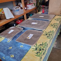 a table with a variety of trays on it