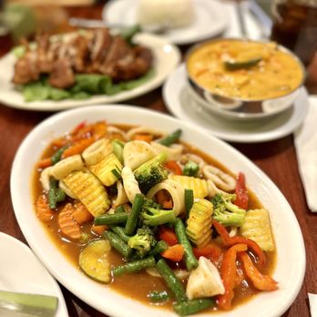 Ricky Thai Bistro - a variety of food on a table - Thai Near Me - North Miami, Florida Ricky Thai Bistro - a variety of food on a table - Thai Near Me - North Miami, Florida