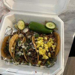 Carne asada and al pastor tacos Carne asada and al pastor tacos