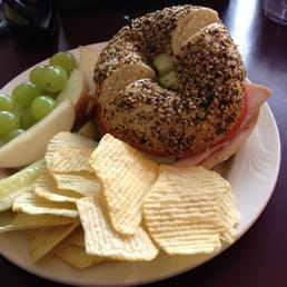 a bagel sandwich and chips