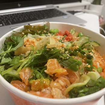 Poki One N Half - Side view, bowl is full ... half salad half rice , salmon, spicy tuna, cilantro, cucumber, ginger, onions,jalapeños, lima beans,sesame seeds - Seafood Near Me - Chula Vista, California