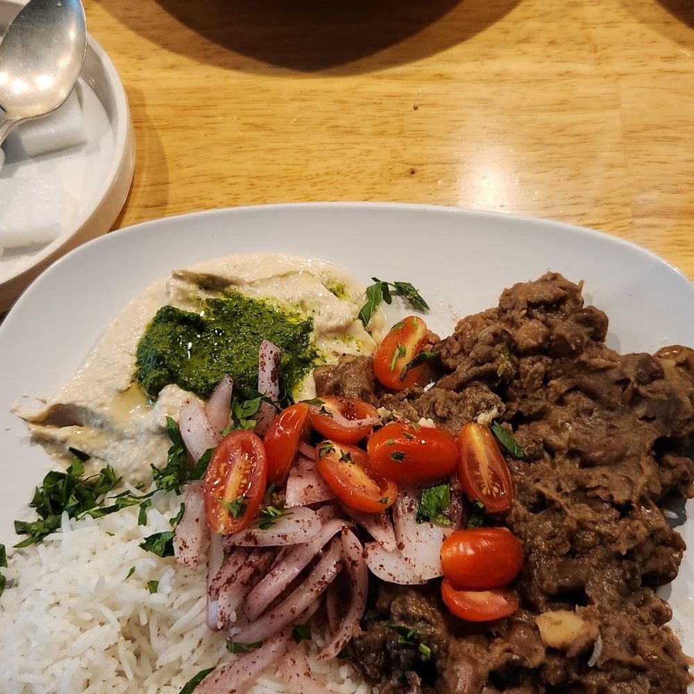 Nineveh Assyrian - Fava beans with hummus and rice. Mahi fish in background. Outstanding. - Middle Eastern Near Me - Olympia, Washington Nineveh Assyrian - Fava beans with hummus and rice. Mahi fish in background. Outstanding. - Middle Eastern Near Me - Olympia, Washington