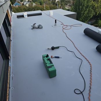 E&J roofing and construction - Tpo installation - Roofing Near Me