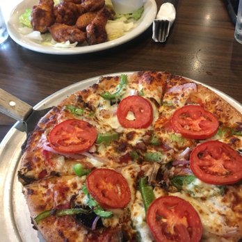 Romio's Pizza Pub - Pizza Near Me - Seattle, Washington Romio's Pizza Pub - Pizza Near Me - Seattle, Washington