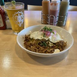 Carnitas Breakfast bowl and a Pacifo draft. Carnitas Breakfast bowl and a Pacifo draft.