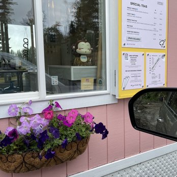 Happy House Tea - a window with flowers in a basket - Bubble Tea Near Me - Anchorage, Alaska