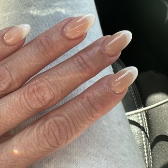 Millions Hair-Nails-Lashes - Acrylic set with soft white French polish + gel overlay by Vivian - Hair Salons Near Me - El Cajon, California