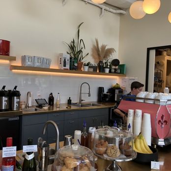 Broadcast Coffee - a woman working in a coffee shop - Coffee & Tea Near Me - Boise, Idaho