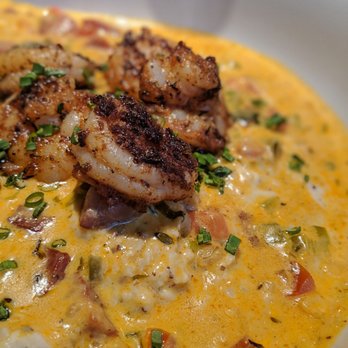 The Hound - The blackened shrimp & creamy grits are what southern folks dream of, with a flavorful, spicy andouille cream. Instagram @tabletopviews - New American Near Me - Auburn, Alabama