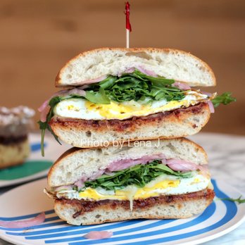 Southdown Coffee - Port Jefferson - Inside of Famous Egg Sandwich ($10.00) - fried egg, bacon, cheddar, arugula, pickled onions, tomato butter. Bread wasn't my favorite. - Coffee & Tea Near Me - Port Jefferson, New York Southdown Coffee - Port Jefferson - Inside of Famous Egg Sandwich ($10.00) - fried egg, bacon, cheddar, arugula, pickled onions, tomato butter. Bread wasn't my favorite. - Coffee & Tea Near Me - Port Jefferson, New York