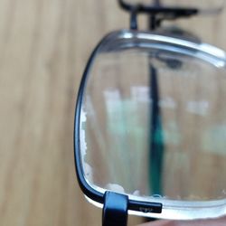 Optometric Expressions - Notice the peeling of the coating on the edge (and center)