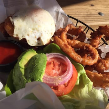 Arizona Wilderness Brewing - After Hike Burger (Beef patty, pork belly brisket, avocado slices, a single onion ring, over medium egg, tomato, lettuce..) - Breweries Near Me - Gilbert, Arizona Arizona Wilderness Brewing - After Hike Burger (Beef patty, pork belly brisket, avocado slices, a single onion ring, over medium egg, tomato, lettuce..) - Breweries Near Me - Gilbert, Arizona