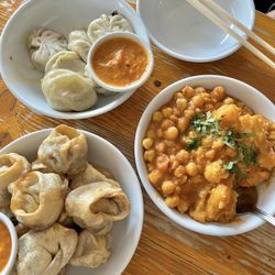 House Of Momo - Steamed veg momos, veg curry, and kothey (steamed and then fried) beef momos
